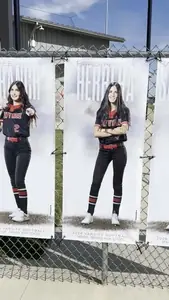Owyhee senior softball banners on the outfield fence