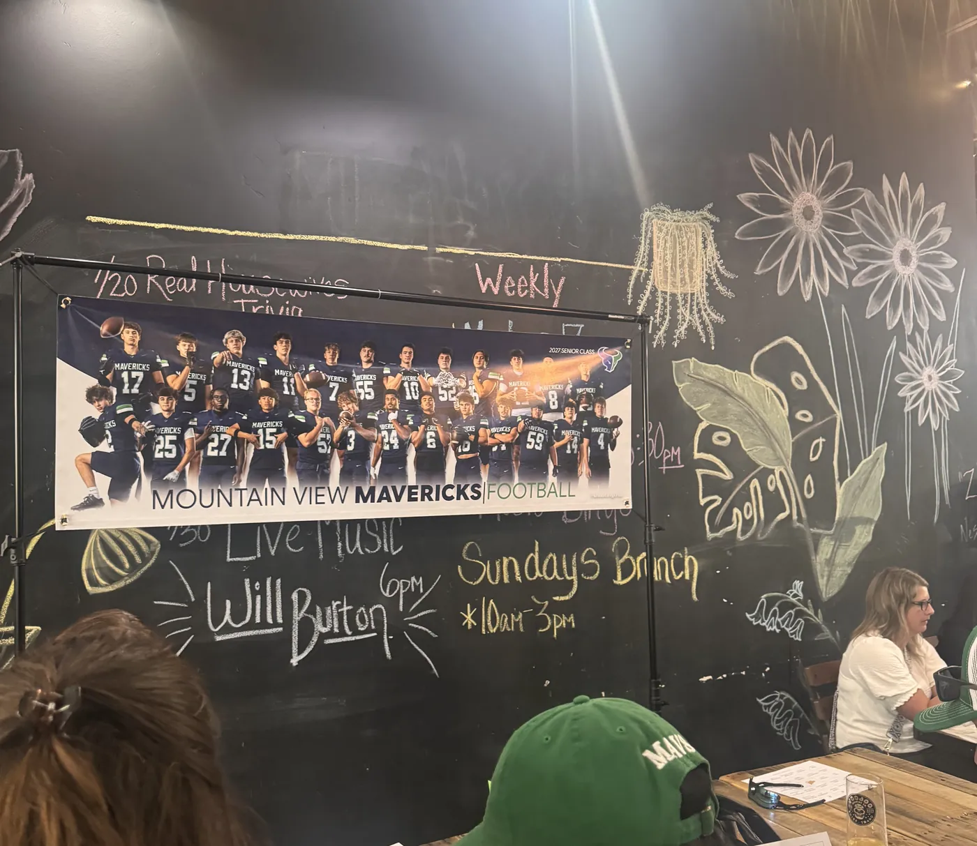 Mountain View football team banner at the booster silent auction fundraiser