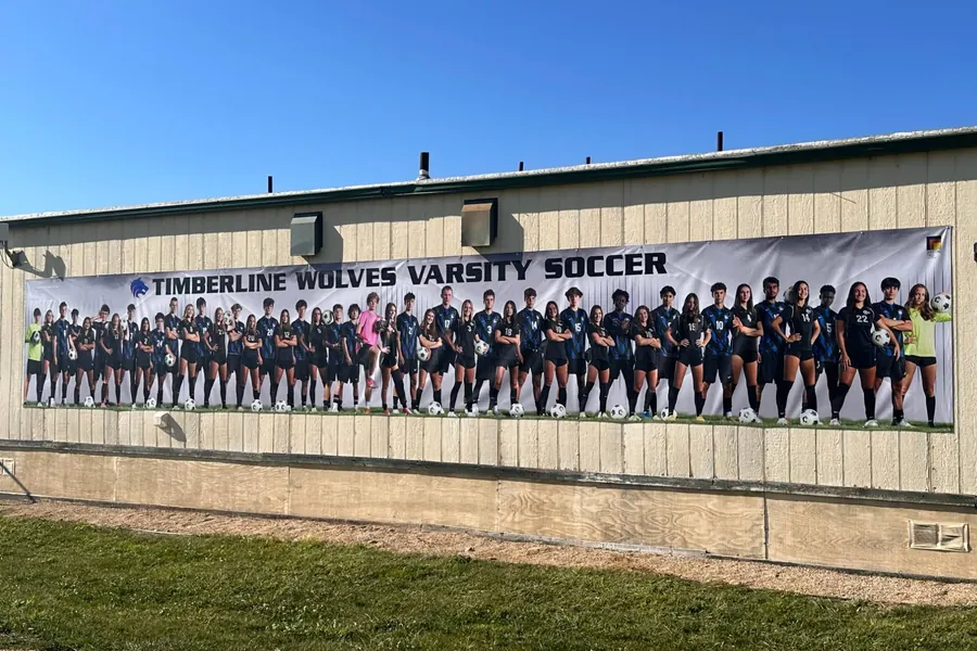 Timberline Wolves varsity soccer 2024 panoramic team banner hanging on an outside wall Boise Idaho
