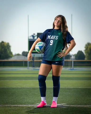 Vivian Sipe #9 full length, ball on her hip and a hand on her waist