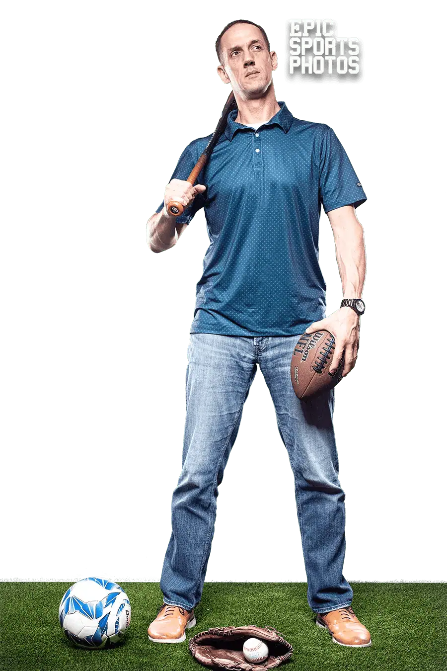 Mark from Shooting Trio Photography with camera on football field in Treasure Valley Idaho