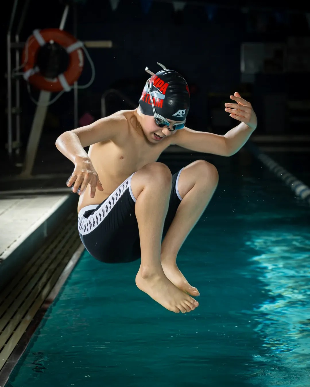 Nampa swim team cannonball jump into the pool Nampa Idaho