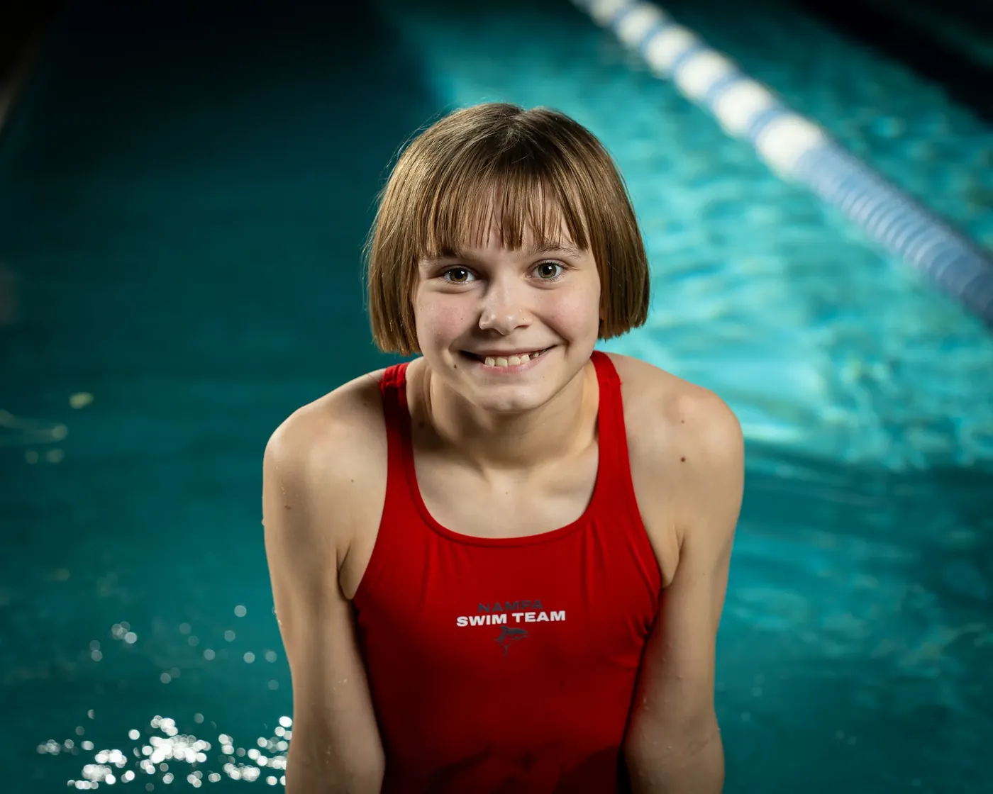 Nampa swim team swimmer portrait in the pool lane Nampa Idaho