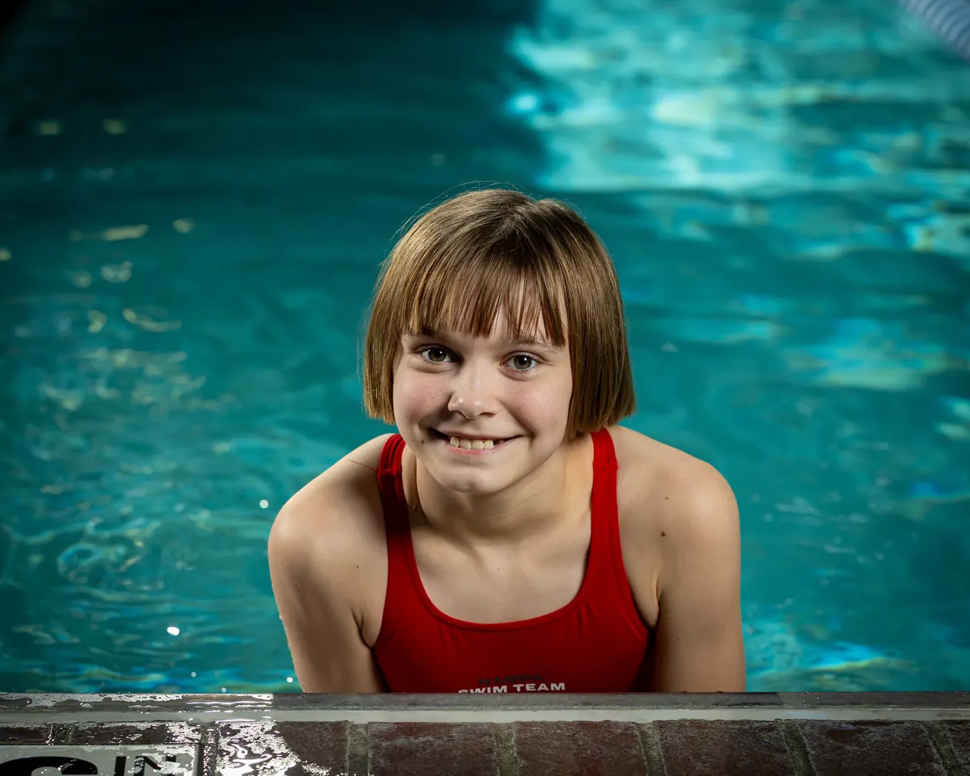 Nampa swim team swimmer at the pool edge Nampa Idaho