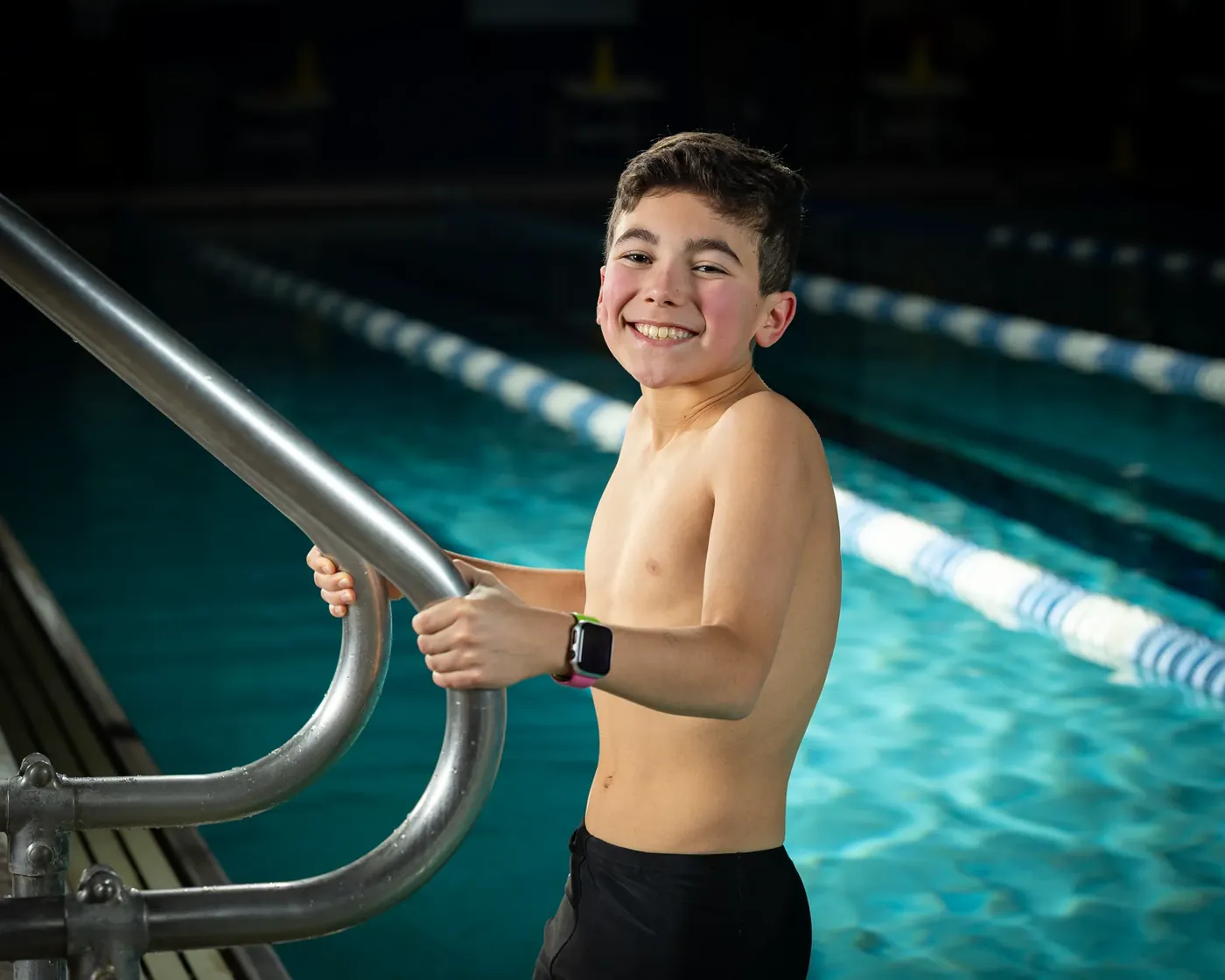 Nampa swim team swimmer portrait at the pool ladder Nampa Idaho