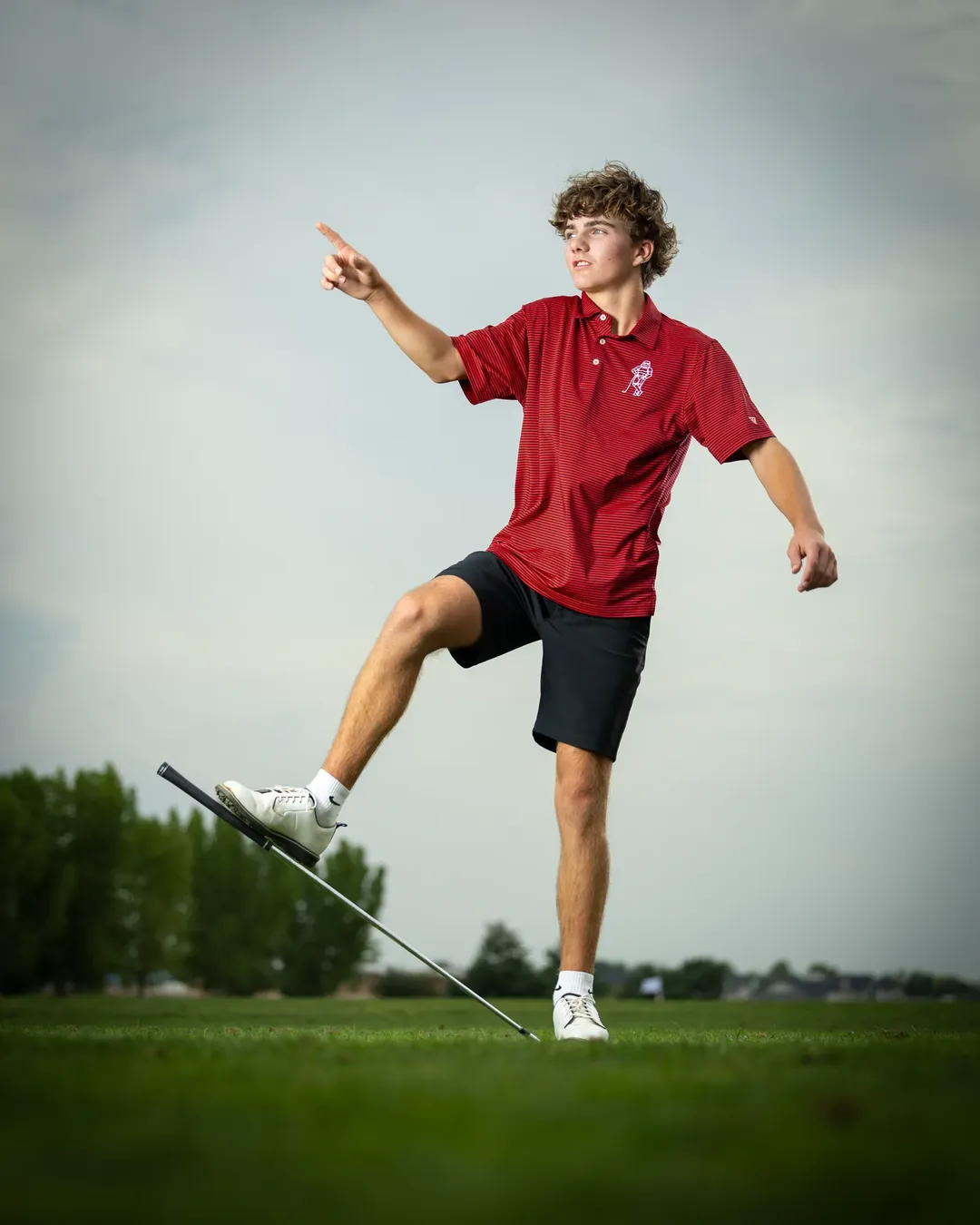 Owyhee High School golfer balancing a club on his shoe Meridian Idaho
